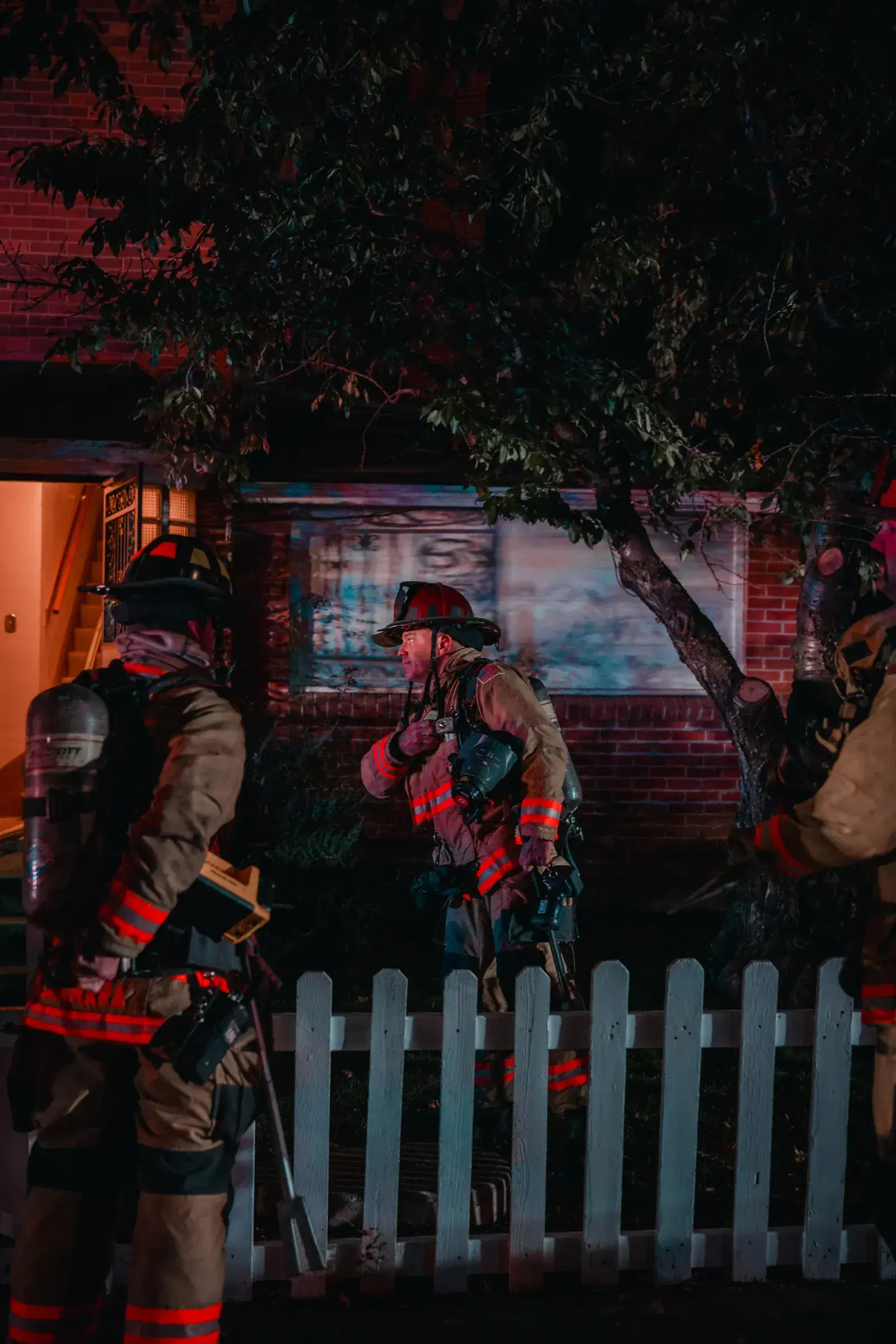 Reno firefighter in full gear at a structure fire